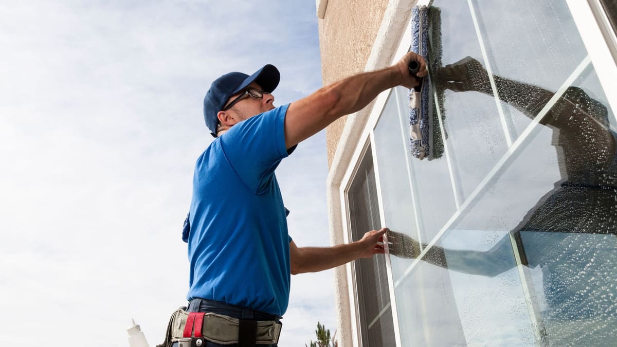 Window cleaning professional washing hard-to-reach exterior house windows